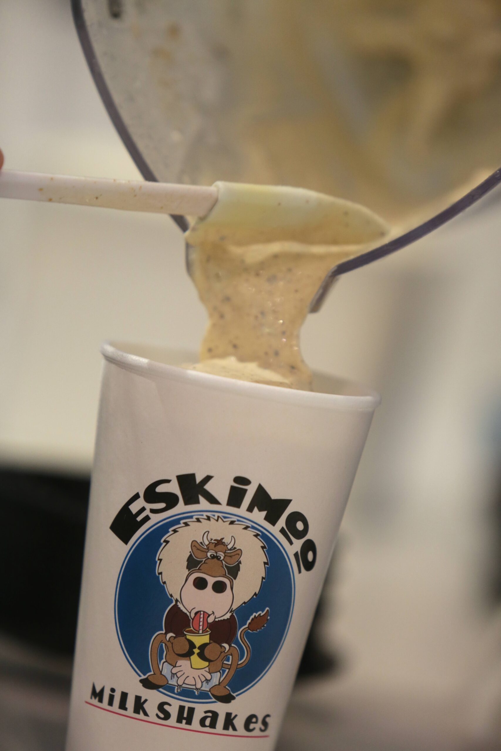 Eskimoo Milkshake being poured into a cup